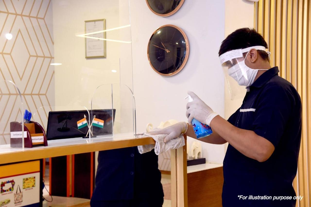Oyo 8273 Diamond Inn Kochi Bagian luar foto